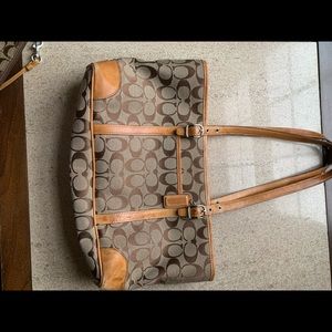 I am selling a Coach Purse and a coin pouch.